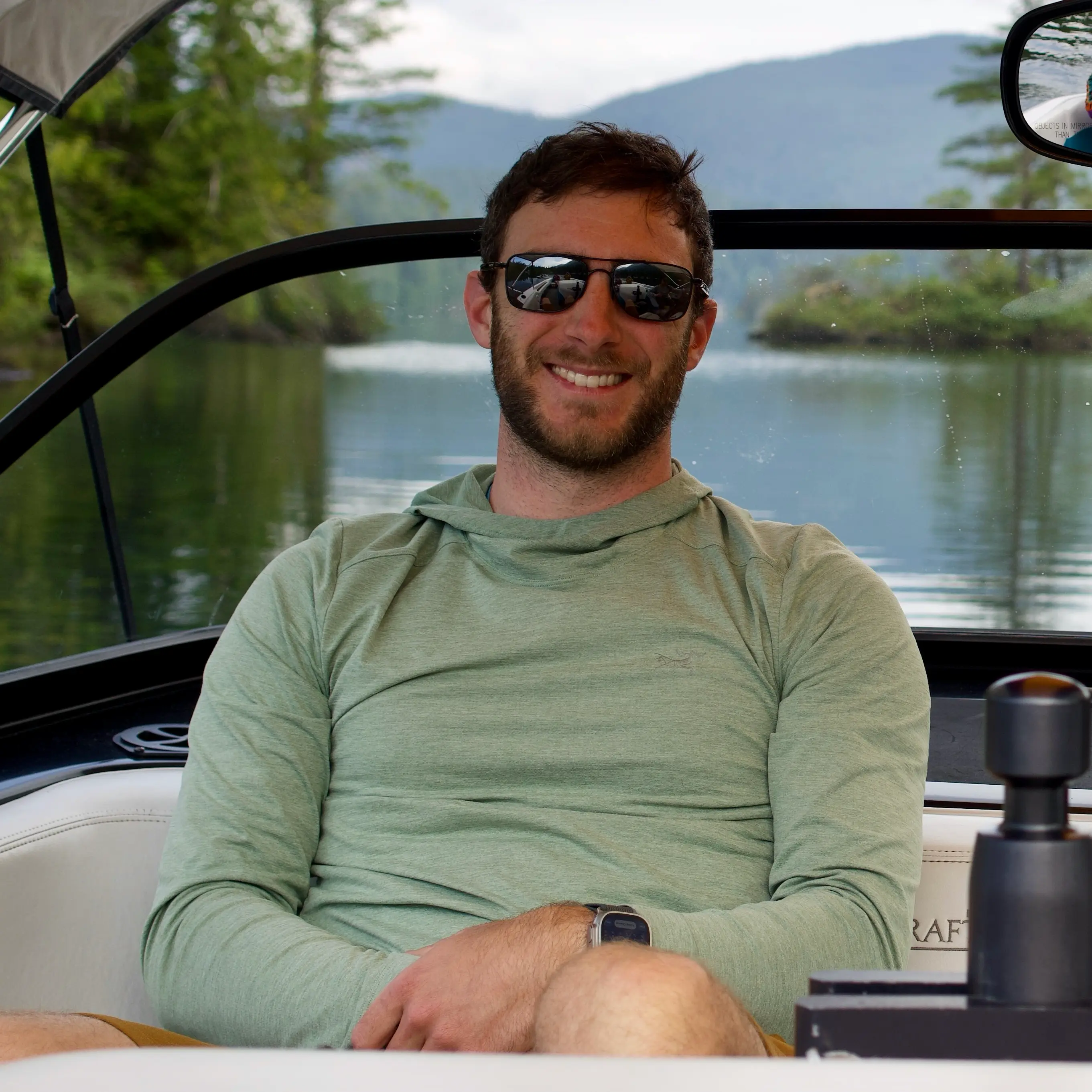 Jon smiling in his boat on Ruby Lake